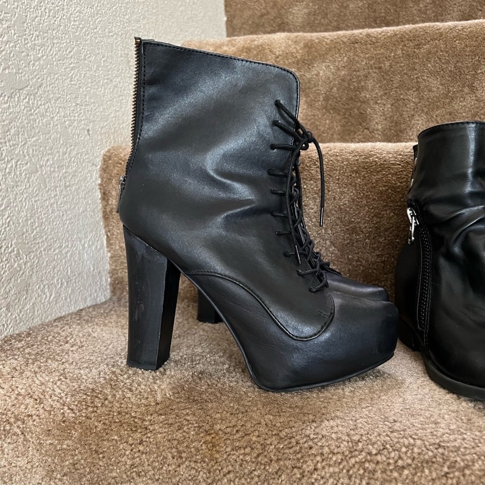 bundle of black boots